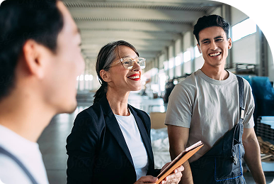 woman smiling with co workers